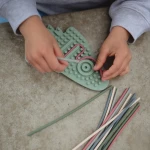 Tablica sensoryczna, labirynt, przeplatanka Rakieta / Mushie