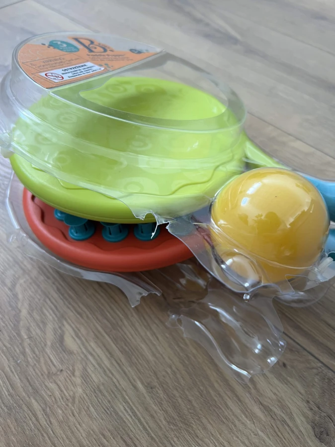 USZKODZONE OPAKOWANIE: Paddle Popper - dwustronne rakietki z piłeczką, koralowe / B.Toys