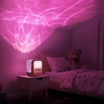 Lampka projekcyjna i głośnik Wavy Light MOB - koralowa / MOB