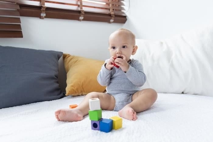 Klocki sensoryczne, interaktywne w woreczku / Plan Toys