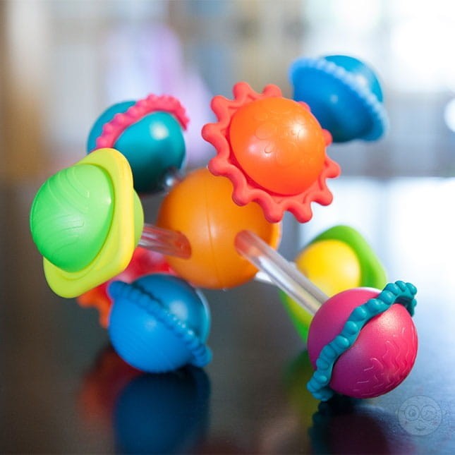 Grzechotka Sensoryczna Przygoda Wimzle / Fat Brain Toys