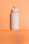 Szklana butelka do monitorowania dziennego nawodnienia Puffer Bottle - SEASHELL / BINK